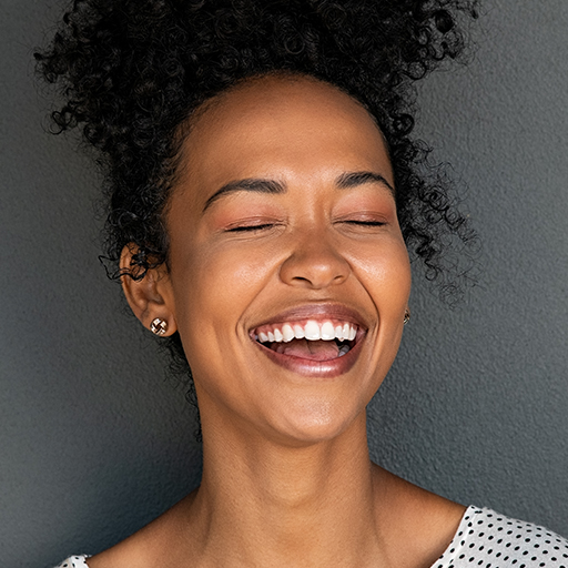 black-carefree-woman-laughing-QY76GB7.jpg